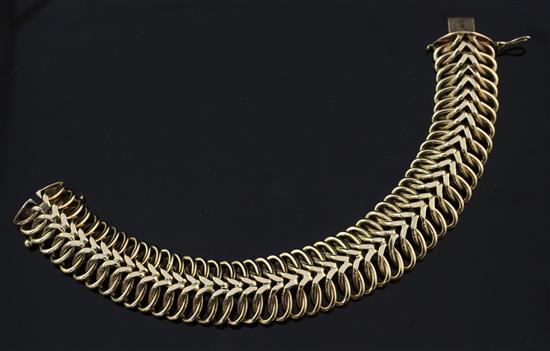 A stylish 1960s 9ct gold interwoven link bracelet, 7.5in.